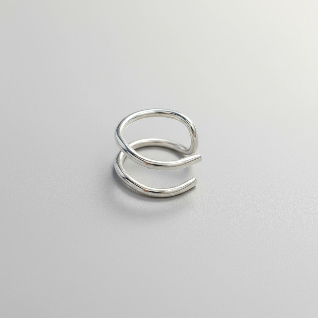 sterling silver ear cuff, no piercing earring, double piercing look, adjustable ear cuff, cartilage cuff, silver ear cuff, minimalist jewellery, dainty ear cuff, handmade jewellery UK, silver cuff earring, ear stack, modern jewellery, sustainable jewellery